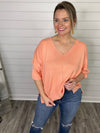 “Calling Your Bluff” Peach Short Sleeve Sweater