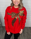 "No Joke" Leopard Print Bow Sequin Sweater