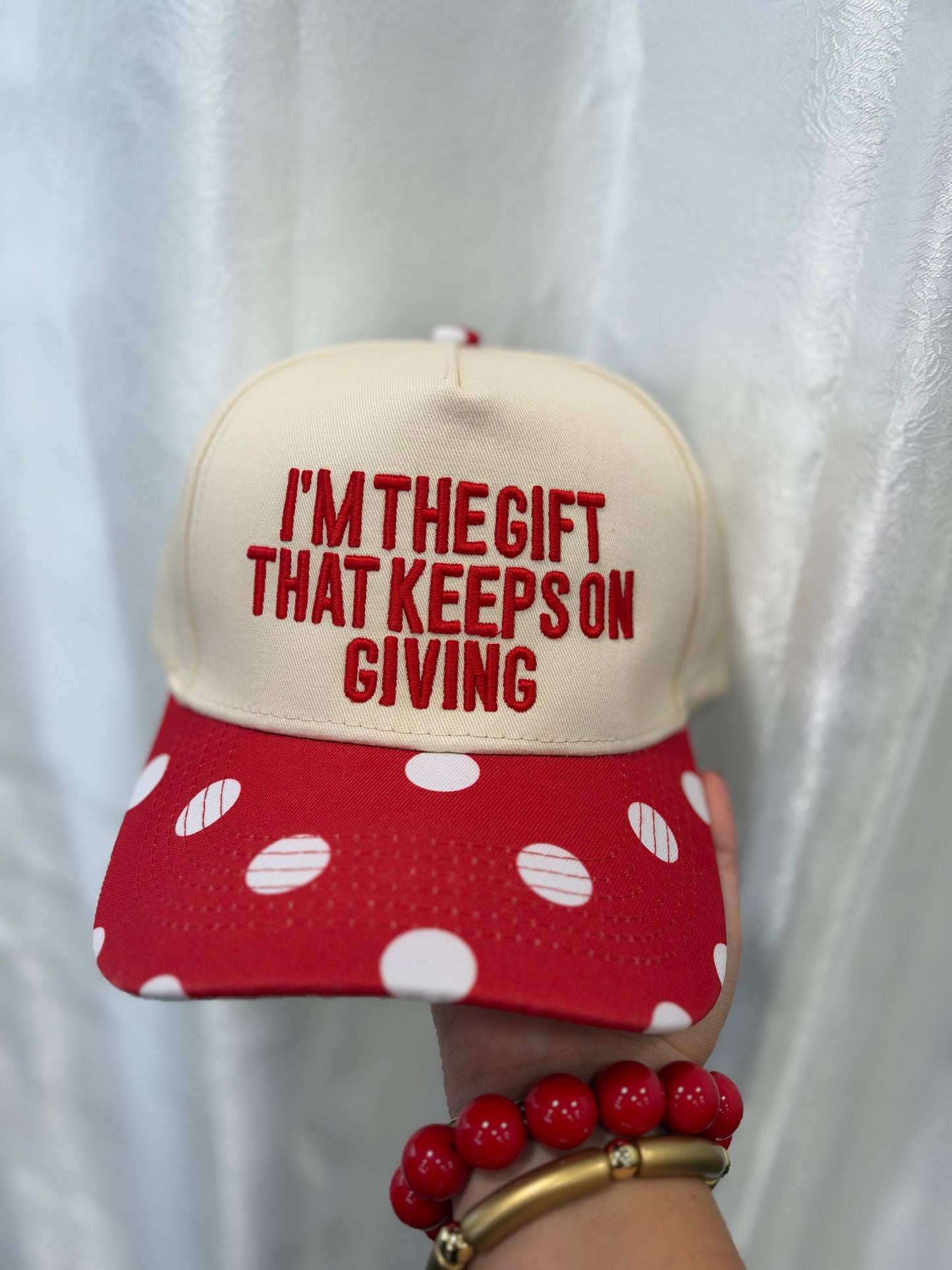 “I’m the gift” trucker hat