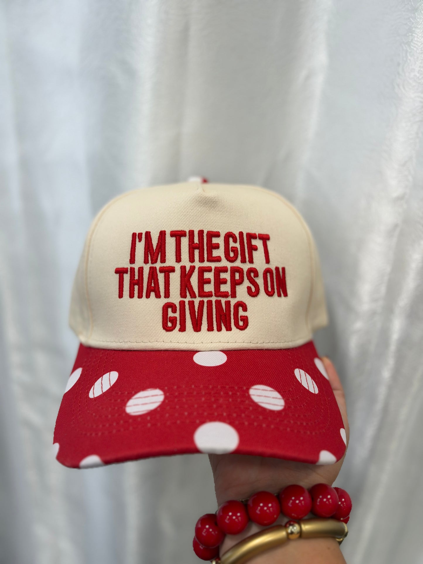 “I’m the gift” trucker hat